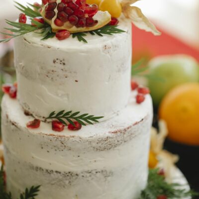 Delicious wedding cake with ground cherries and fresh pomegranate