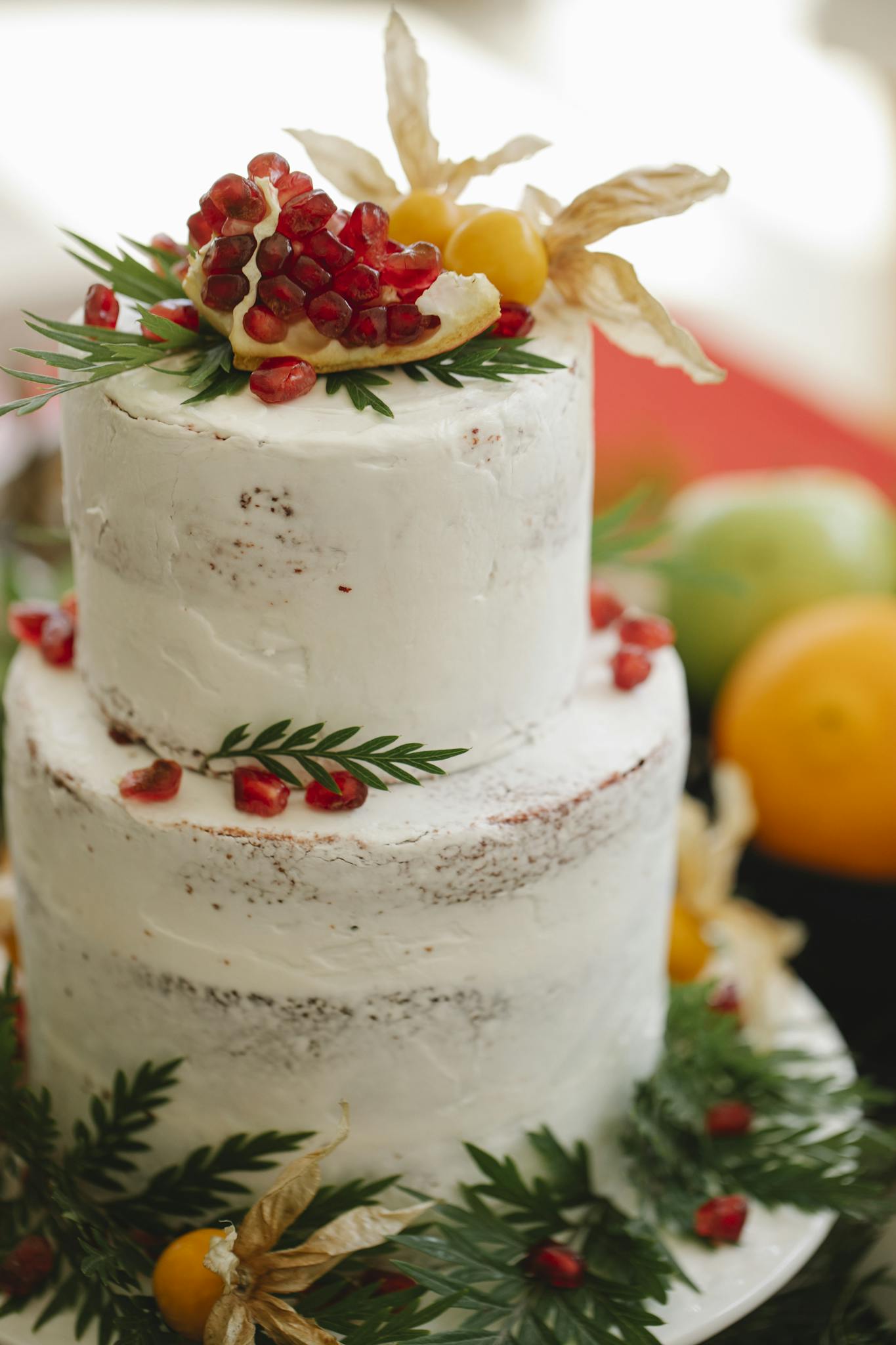 Delicious wedding cake with ground cherries and fresh pomegranate